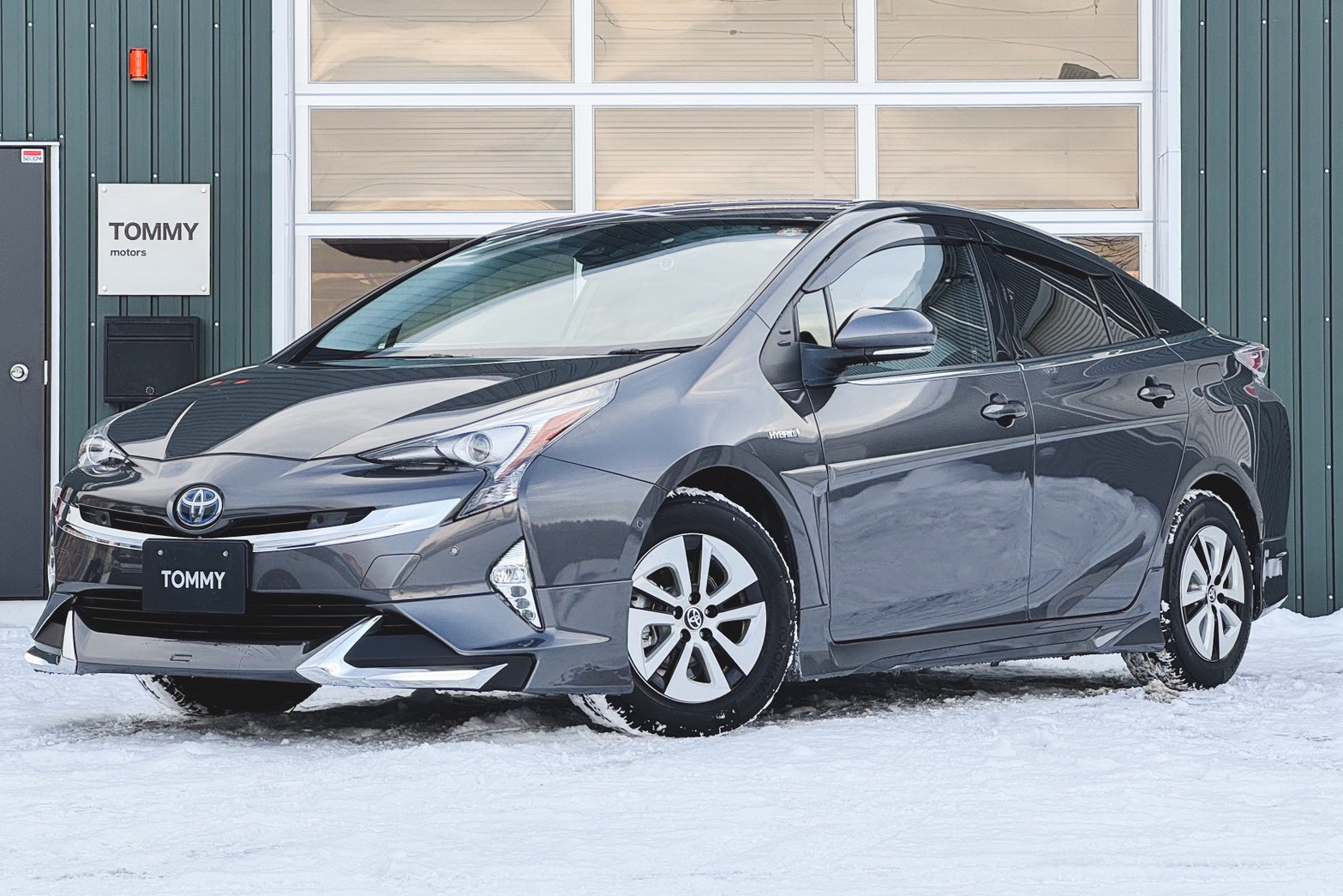 トヨタ プリウス 1.8Aプレミアム E-Four 4WD　HUD・BSM・モデリスタエアロ・バックカメラ・オートハイビーム・パーキングアシスト・ETC