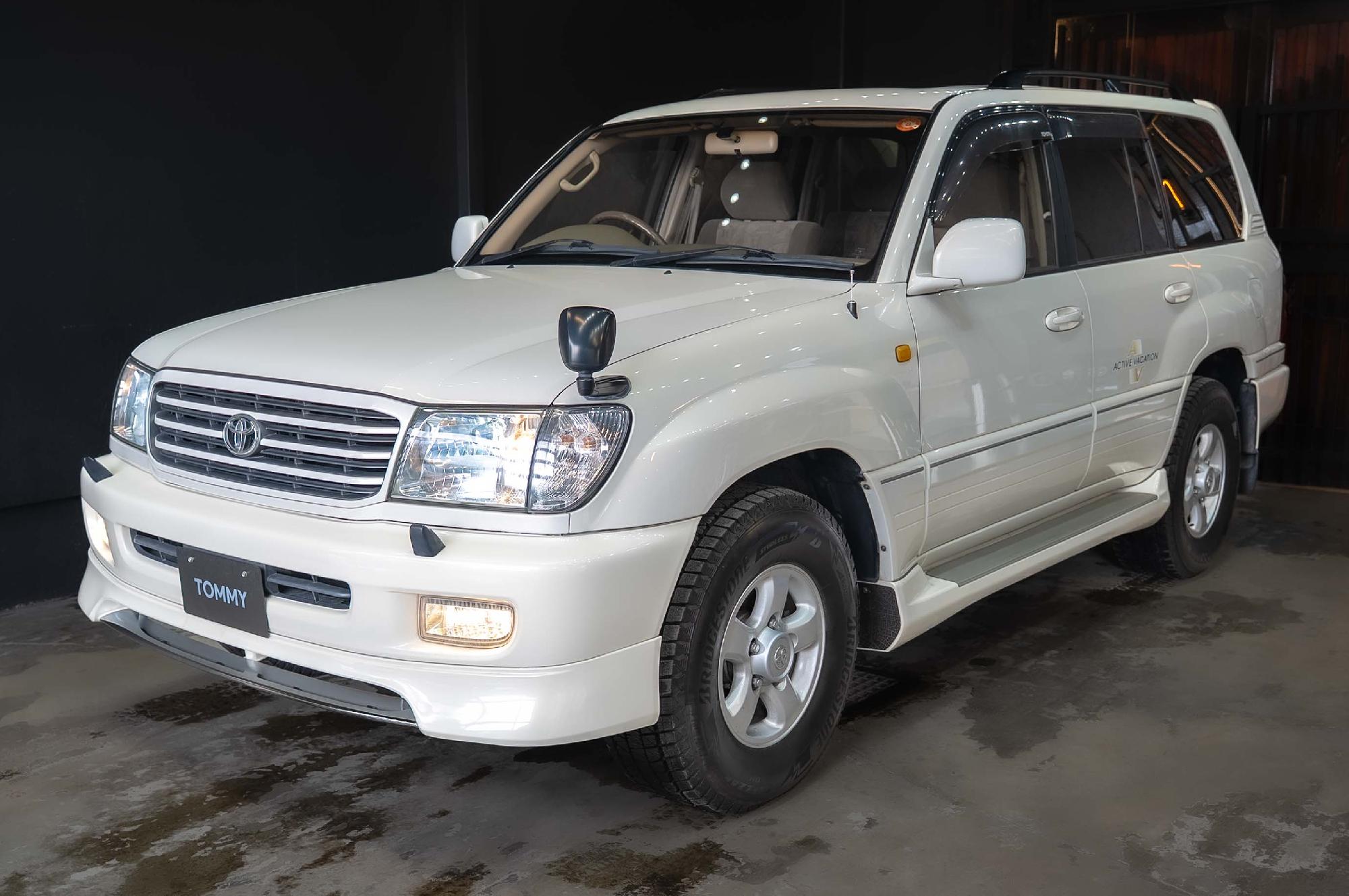 トヨタ ランドクルーザー100 4.2DT VXリミGアクティブV B4WD　ETC ナビ ムーンルーフ GANADORマフラー フラットベッドキット